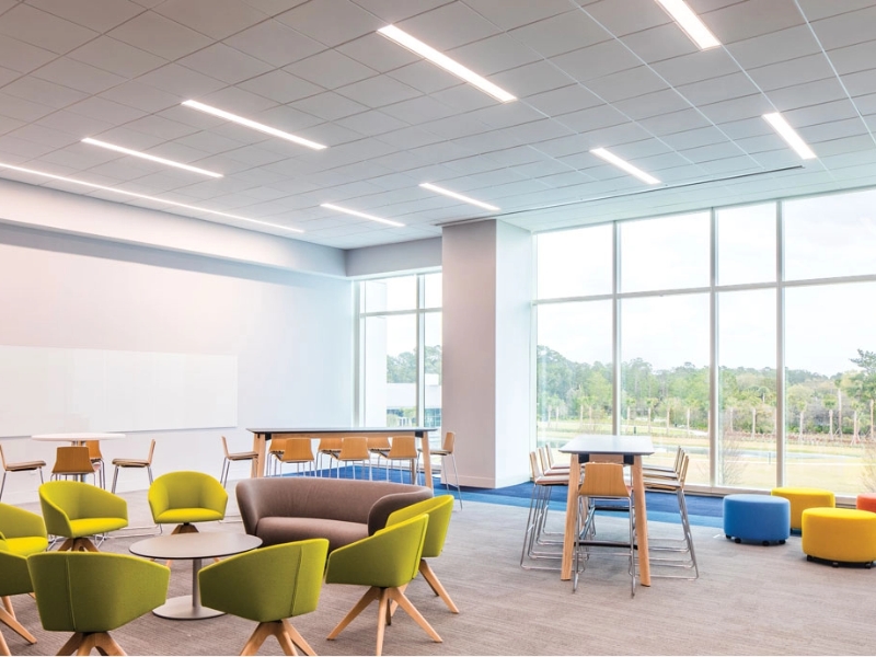 4DS downlights, PX Slot ambient, and 6CR cylinders provide soft lighting for a modern reception area.